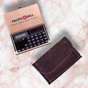 Pacific Bell Solar Calculator in Solid Brass Case (USA) Pocket Size Works Advert